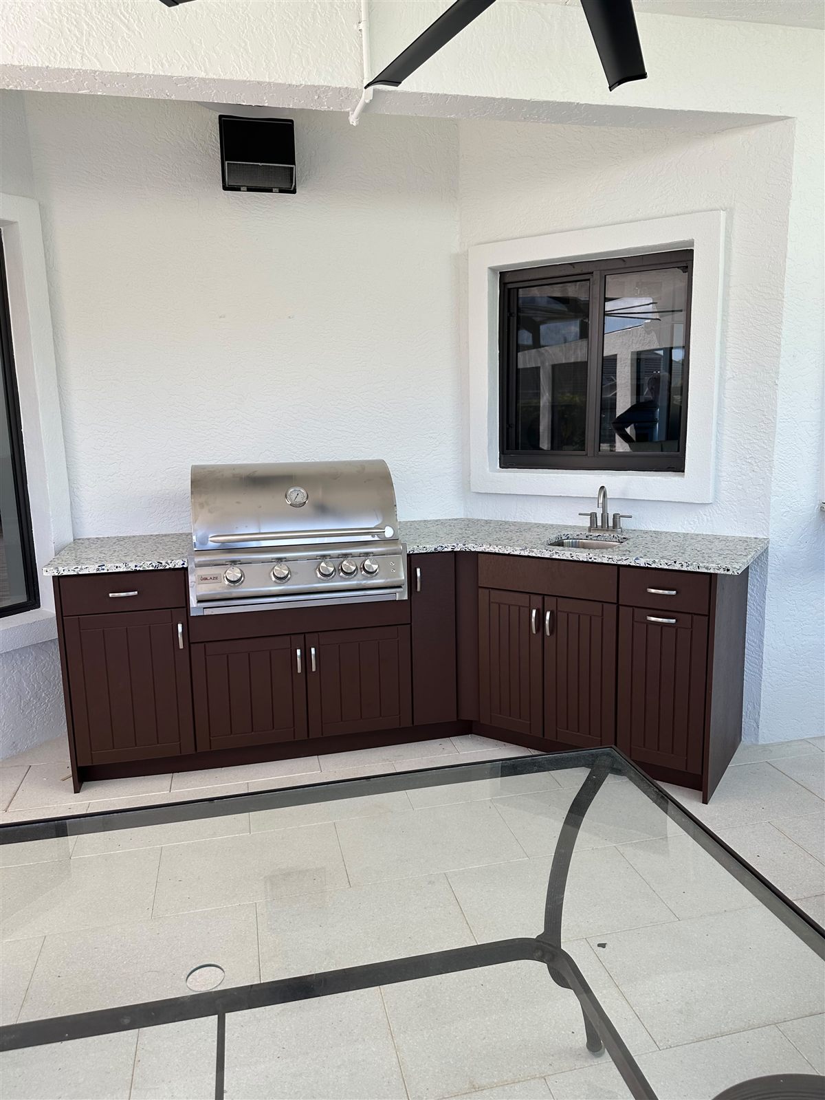 Espresso line outdoor kitchen built by Bespoke Cabinets and Doors